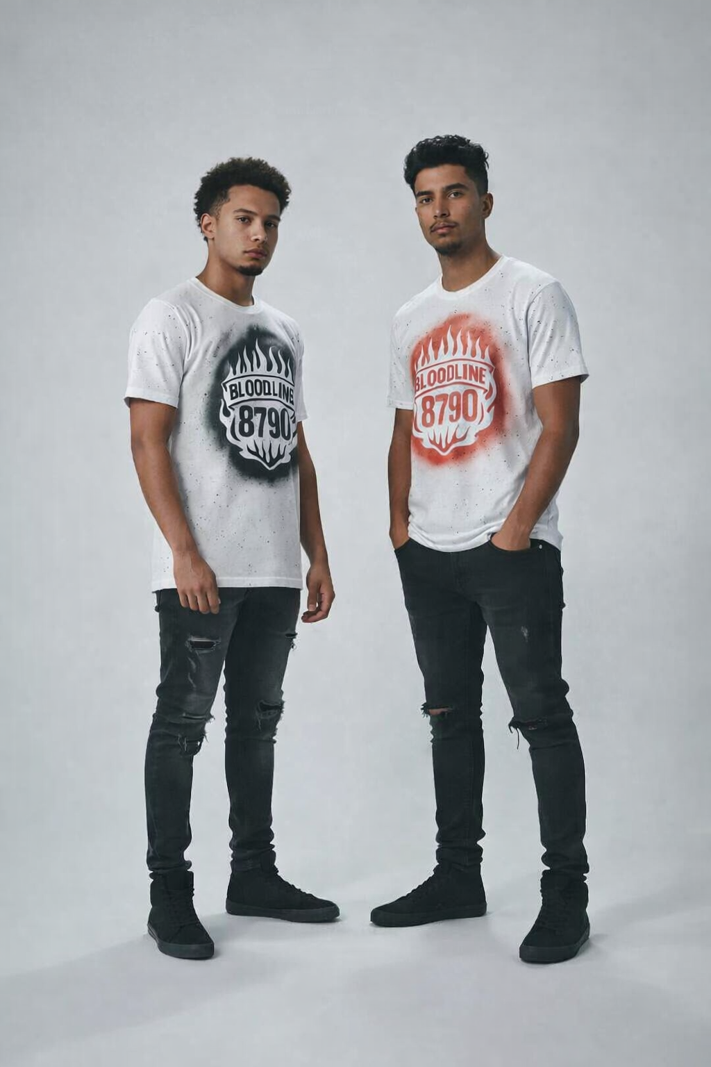 Bloodline 8790 Flame Crest Tee in white with bold flame crest graphic in black and red, styled with ripped black jeans for urban streetwear fashion.