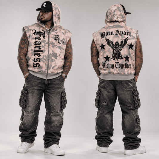 distressed sleeveless zip hoodie in pink and gray camo with bold black graphics and raw distressed details, styled oversized